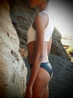 Kaia Cut-out Swimsuit in Gold and Black metallic textures