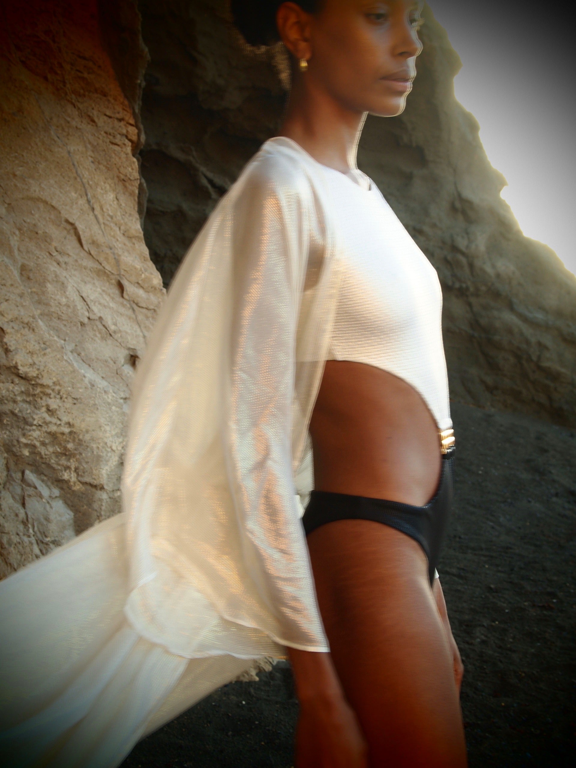 Kaia Cut-out Swimsuit in Gold and Black metallic textures