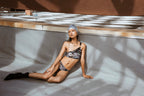 Designer asymmetric two piece